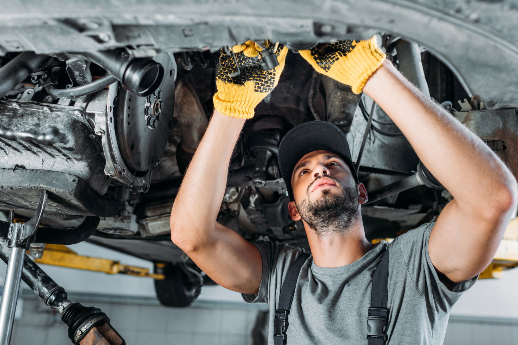 professional-mechanic-repairing-a-car-in-auto-repa-2021-08-29-22-49-41-utc comp